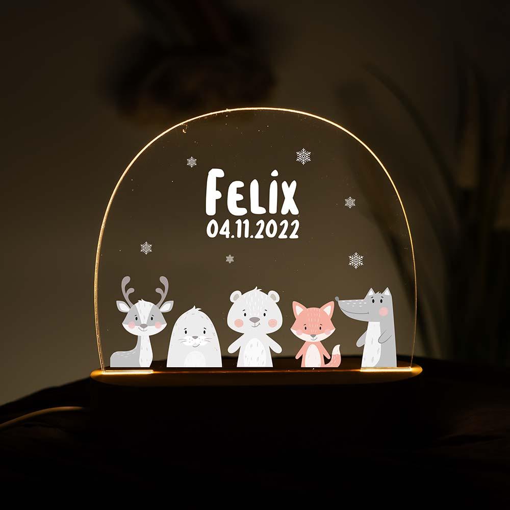 "handcrafted night lamp with winter animals and snowflakes engraving