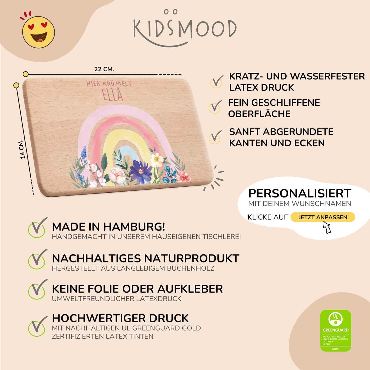 detailansicht der gravur auf dem frühstücksbrettchen mit blumen-regenbogen