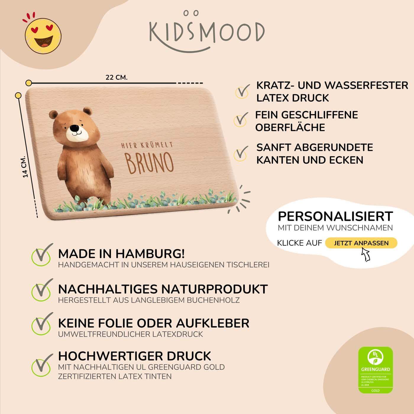 detailansicht der gravur auf dem frühstücksbrettchen mit bär und regenbogen