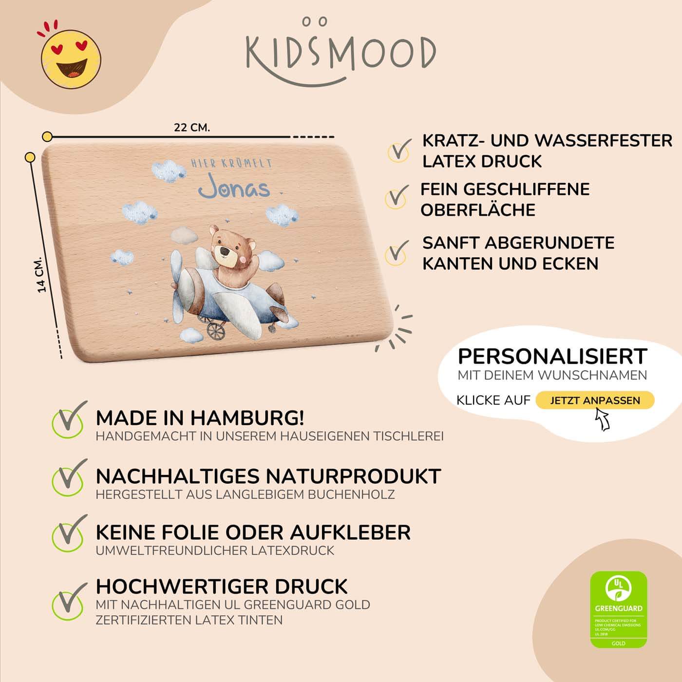 detailansicht der gravur auf dem frühstücksbrettchen mit flugzeug