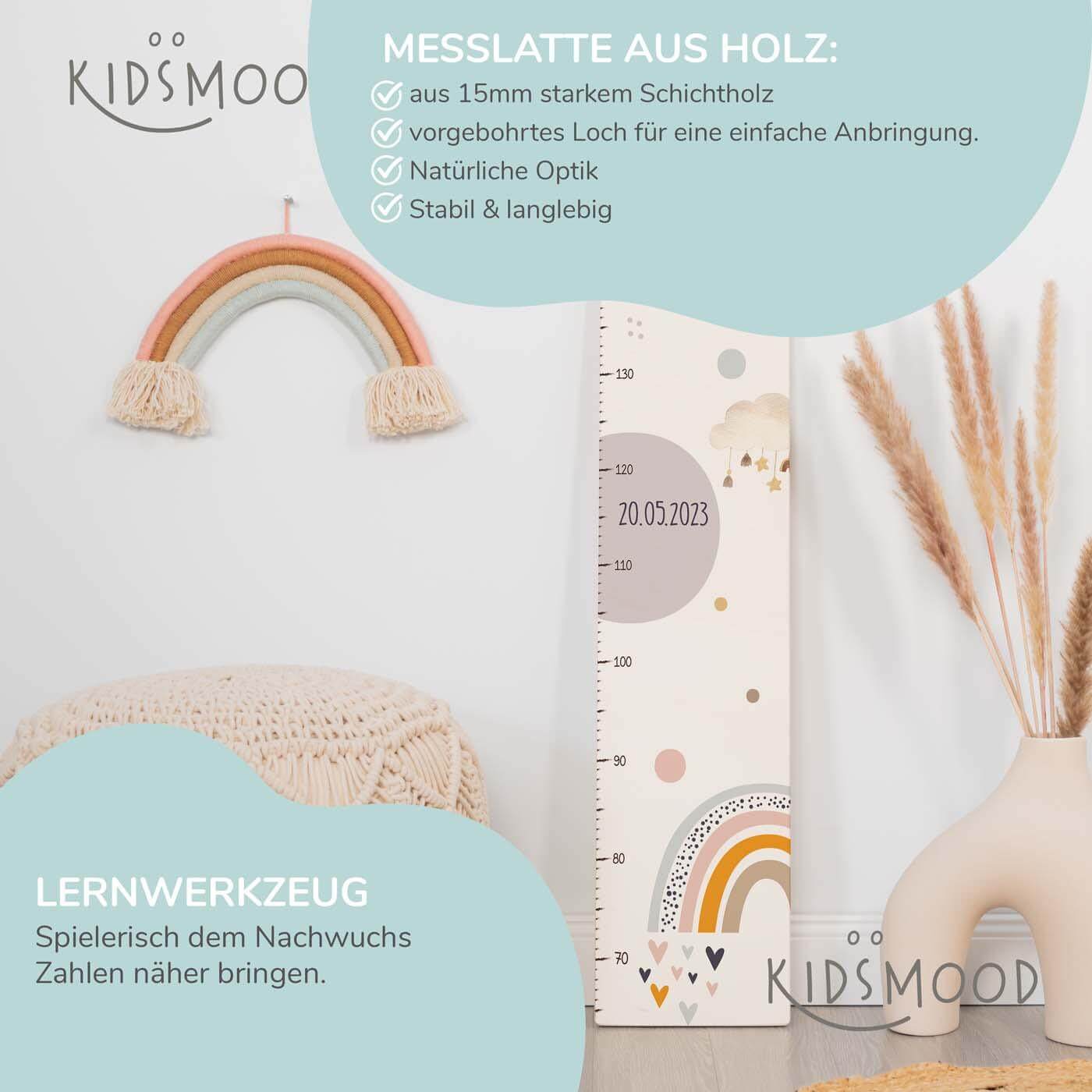 close-up of growth chart with rainbow and clouds motif