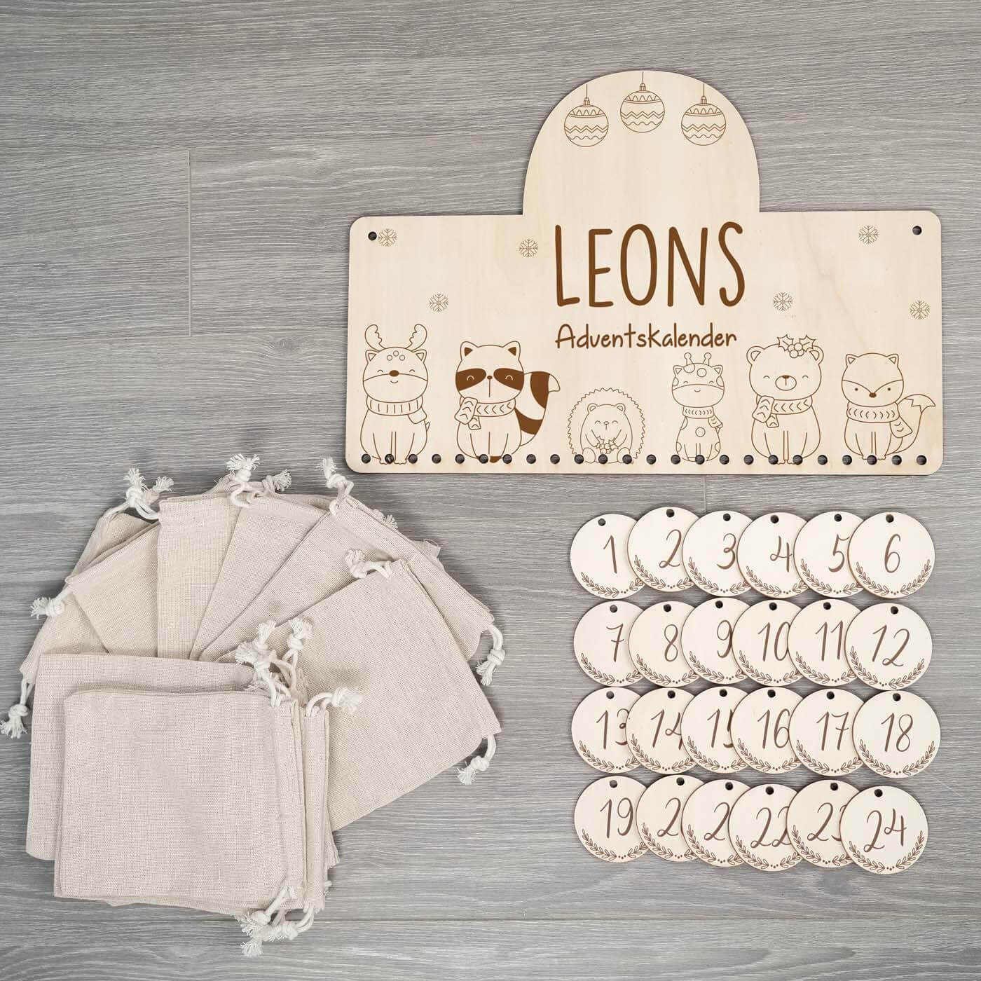 engraved wooden advent calendar with animal family