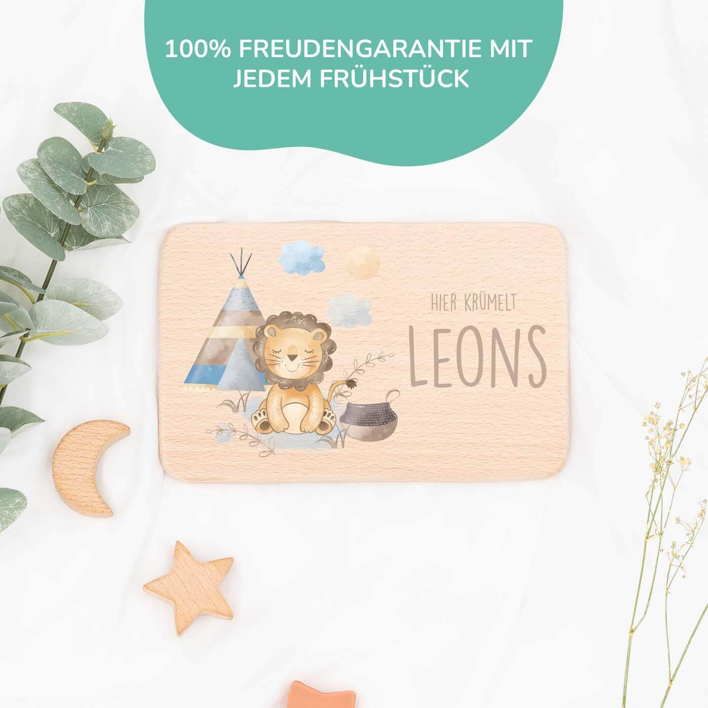 nahaufnahme des frühstücksbrettchens mit tipi-löwe motiv