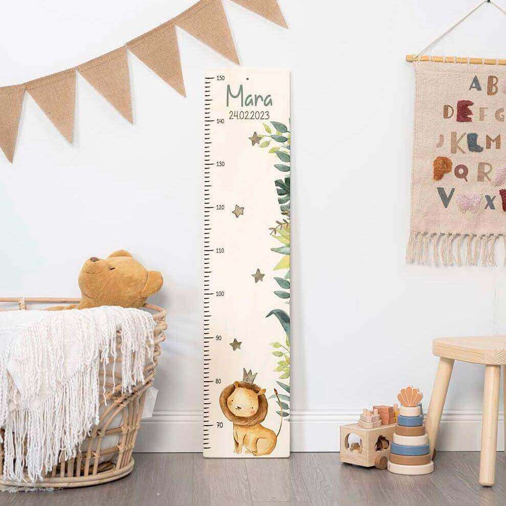 handcrafted height chart with lion engraving