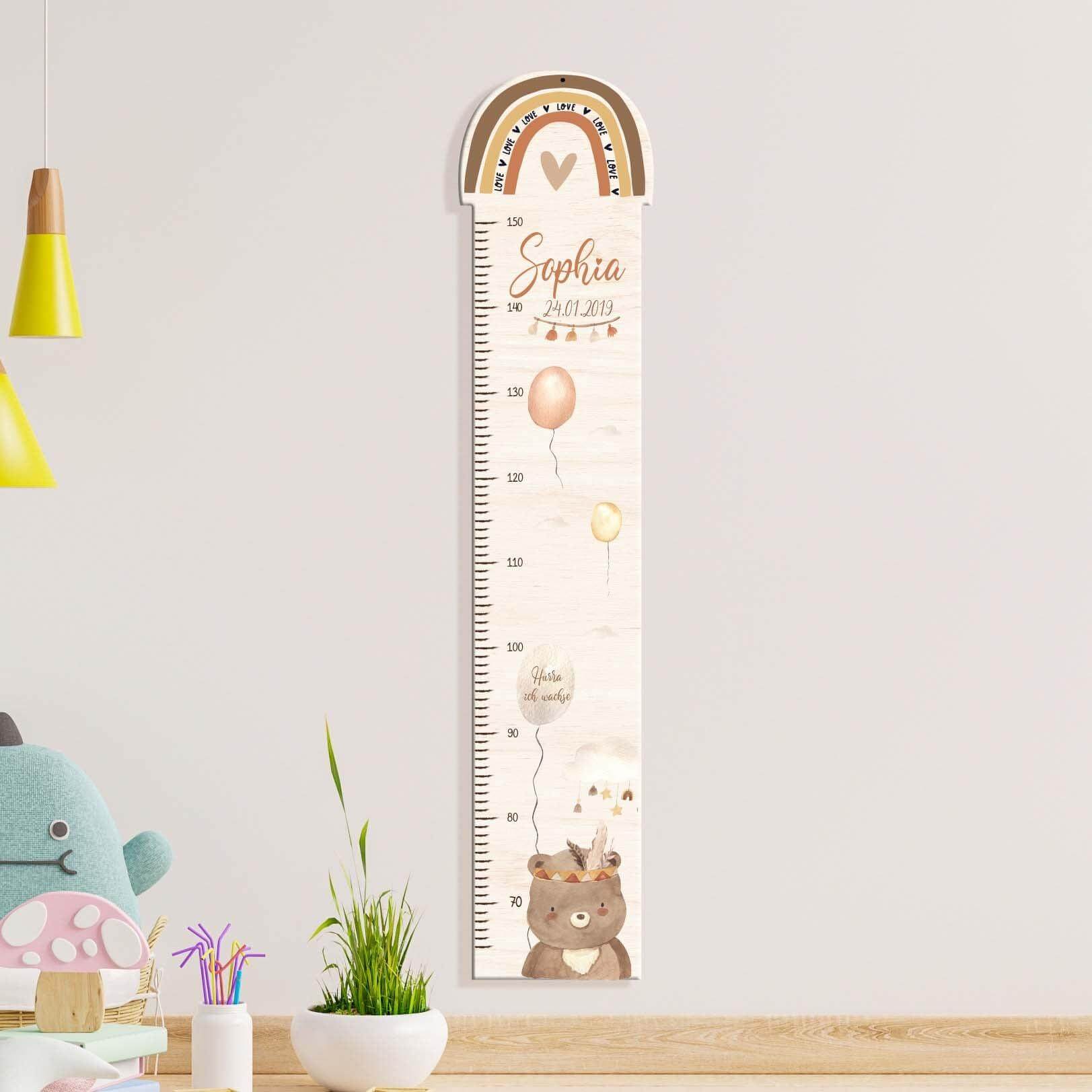 custom rainbow design on wooden height chart